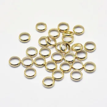 50 kom. trajnog mesing razuporne perle s premazom od ovog 18-karatnog zlata, bez nikla, Rondelle 4x1 mm, otvor: 3 mm